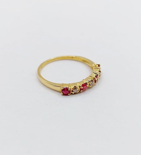 Bague 50 Demi-alliance vintage en or 18k, rubis et diamants 58 Facettes A06820
