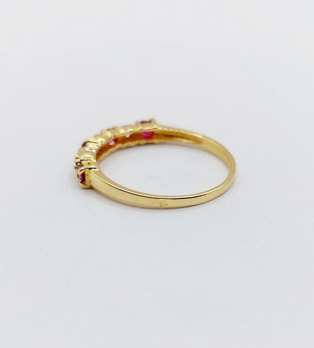 Bague 50 Demi-alliance vintage en or 18k, rubis et diamants 58 Facettes A06820