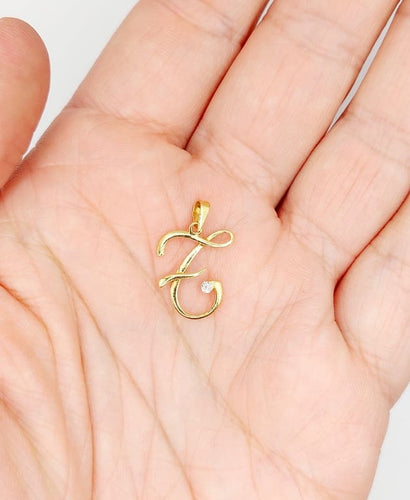 Pendentif Pendentif lettre F vintage en or jaune 18 carats et diamant 58 Facettes A06825