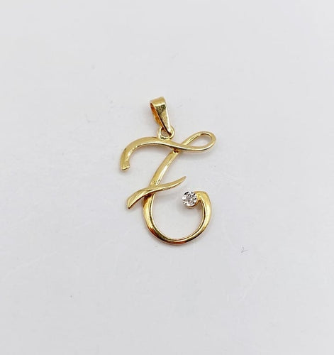 Pendentif Pendentif lettre F vintage en or jaune 18 carats et diamant 58 Facettes A06825