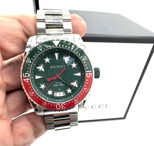 Montre Gucci Dive - Montre homme Plongée 136.2 à quartz 58 Facettes 260035