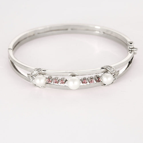 Bracelet Bracelet jonc en or gris ajouré de perles de cultures et diamants 58 Facettes LF6