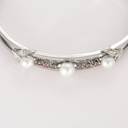 Bracelet Bracelet jonc en or gris ajouré de perles de cultures et diamants 58 Facettes LF6