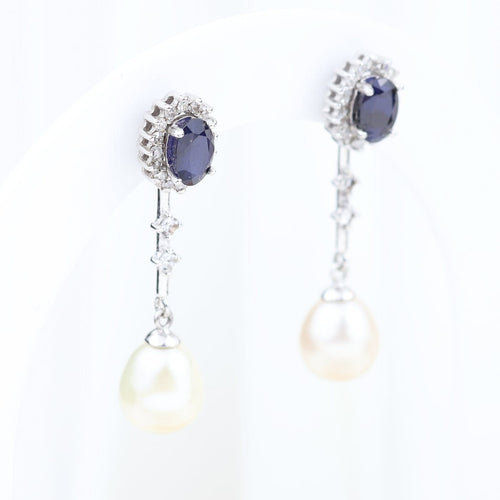 Montre Pendientes convertibles en or blanc 18K avec saphirs, diamants et perle 58 Facettes 138512