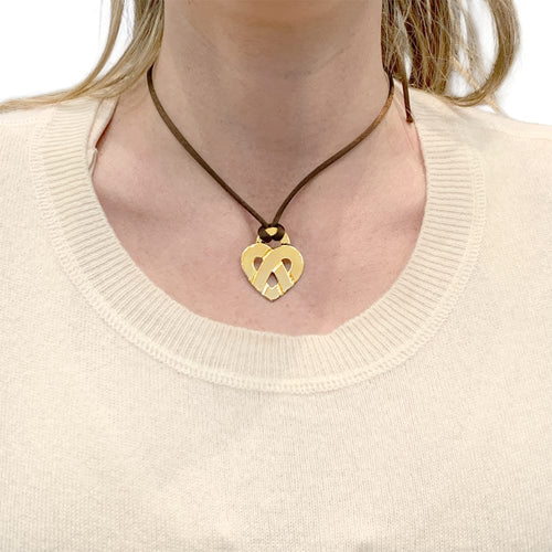 Pendentif Pendentif Poiray, "Coeur Entrelacé", or jaune. 58 Facettes 35395