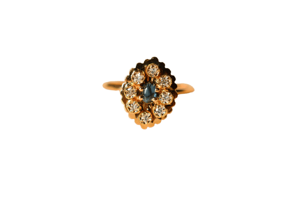 Bague marguerite plateau en or jaune 18 carats, saphir et diamants 58 Facettes 3743