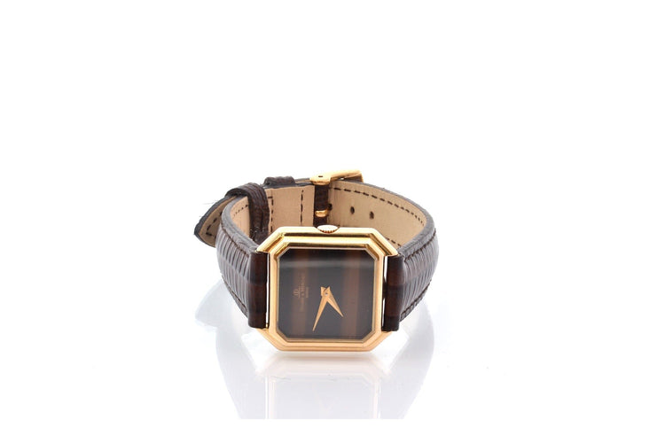 Baume & Mercier - Montre vintage en or 58 Facettes 27691
