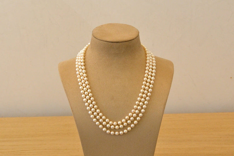 Collier Collier de perles de culture avec fermoir en or jaune 58 Facettes 27986