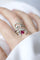 Bague 61 Arabesque - Bague en or blanc rubis birman et diamants 58 Facettes