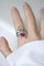 Bague 61 Arabesque - Bague en or blanc rubis birman et diamants 58 Facettes