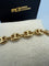 Bracelet Bracelet graine de café - Gourmette en or jaune 18 carats 58 Facettes 260104