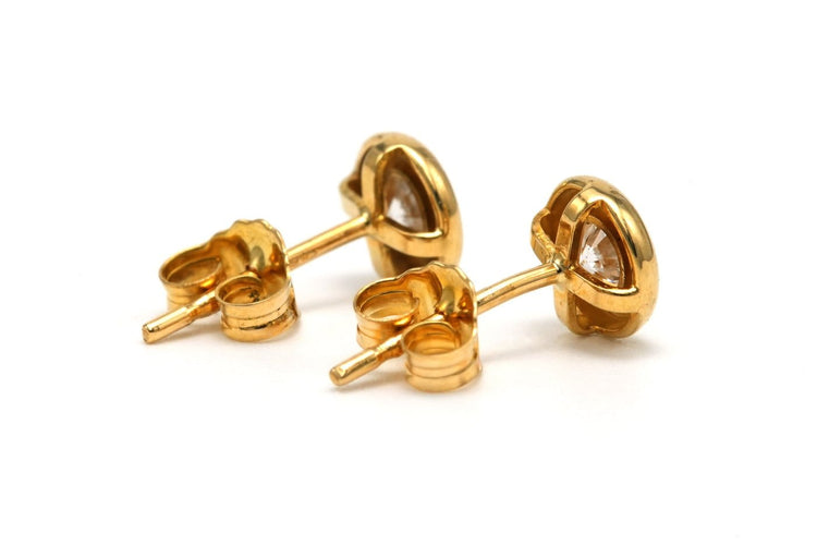 Boucles d'oreilles Boucles d’oreilles contemporaines en or jaune 18 carats serties de diamants 58 Facettes B829