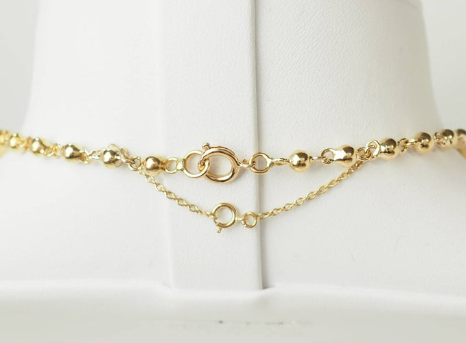 Collier Collier marseillais à boules en chute en or rose 18 kt 58 Facettes 33664