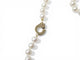 Collier Dinh Van - Collier menottes en or jaune 18k et perles d'eau douce 58 Facettes 273895
