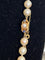 Collier Collier choker Akoya - 63 perles de culture, fermoir en or 18k et saphirs 58 Facettes 000