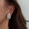 Boucles d'oreilles Boucles d'oreilles feuilles à diamants en or blanc 18 ct 58 Facettes 31914