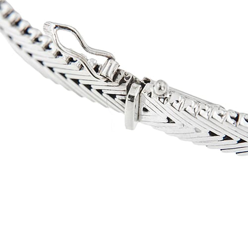 Bracelet Bracelet en or blanc 18 ct avec émeraudes et diamants 58 Facettes 41153