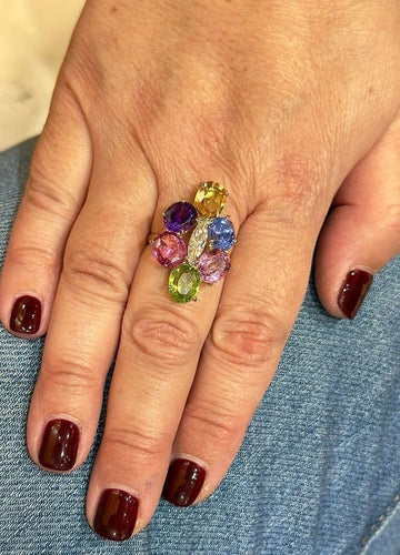 Bague 61 Bague en or jaune 18 carats sertie d’un diamant et de saphirs 58 Facettes