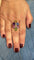 Bague 61 Bague en or jaune 18 carats sertie d’un diamant et de saphirs 58 Facettes