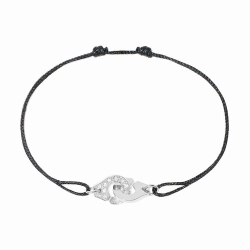 Bracelet Dinh Van Menottes - Bracelet sur cordon XS en or blanc et diamants 58 Facettes Dv