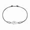 Bracelet Dinh Van Menottes - Bracelet sur cordon XS en or blanc et diamants 58 Facettes Dv