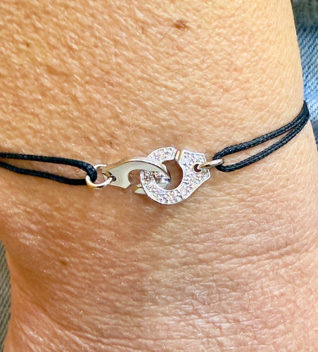 Bracelet Dinh Van Menottes - Bracelet sur cordon XS en or blanc et diamants 58 Facettes Dv