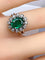 Bague 46 Bague marguerite en or blanc 18 carats, émeraude et diamants 58 Facettes AB693