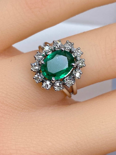 Bague 46 Bague marguerite en or blanc 18 carats, émeraude et diamants 58 Facettes AB693