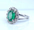 Bague 46 Bague marguerite en or blanc 18 carats, émeraude et diamants 58 Facettes AB693