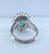 Bague 46 Bague marguerite en or blanc 18 carats, émeraude et diamants 58 Facettes AB693