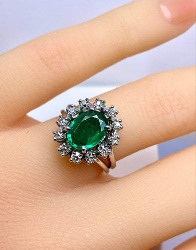 Bague 46 Bague marguerite en or blanc 18 carats, émeraude et diamants 58 Facettes AB693
