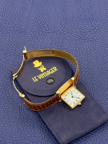 Montre Cartier Tank Réversible - Montre en or jaune, cadran « Paris » (réf. 2582) 58 Facettes 070