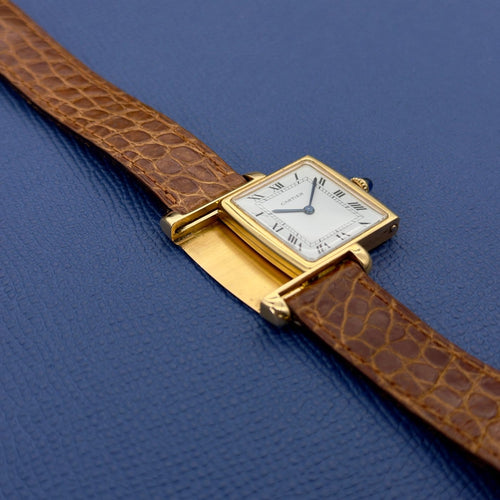 Montre Cartier Tank Réversible - Montre en or jaune, cadran « Paris » (réf. 2582) 58 Facettes 070