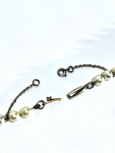 Collier Collier de perles avec fermoir en or blanc 18 carats 58 Facettes 1734922