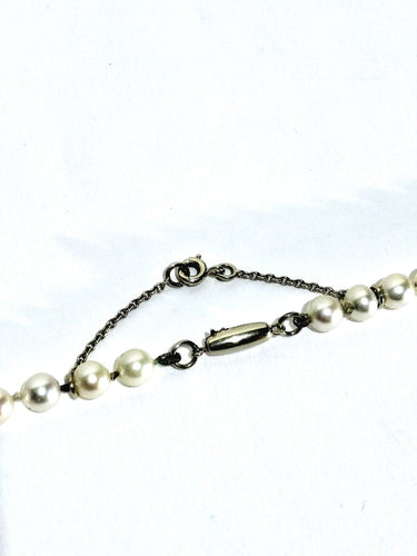 Collier Collier de perles avec fermoir en or blanc 18 carats 58 Facettes 1734922