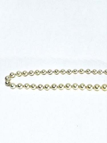 Collier Collier de perles avec fermoir en or blanc 18 carats 58 Facettes 1734922