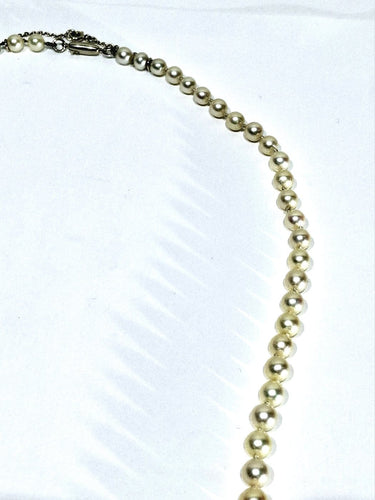 Collier Collier de perles avec fermoir en or blanc 18 carats 58 Facettes 1734922