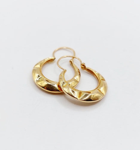 Boucles d'oreilles Créoles vintage - Boucles d'oreilles en or jaune 18k à motifs géométriques 58 Facettes A06930