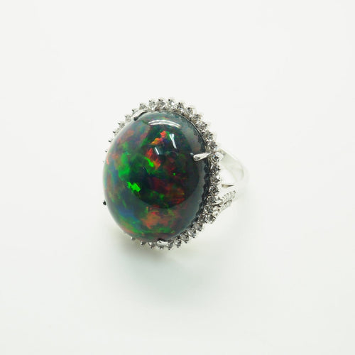 Bague 54 Bague en or 18 carats, opale et diamants 58 Facettes 4803