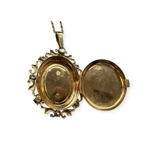 Pendentif Pendentif porte-photo ancien en or jaune 750 avec perles et grenat 58 Facettes 330094588