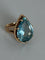 Bague 50 Bague en fils d’or jaune 18k avec zircon bleu poire 58 Facettes LOT 7527