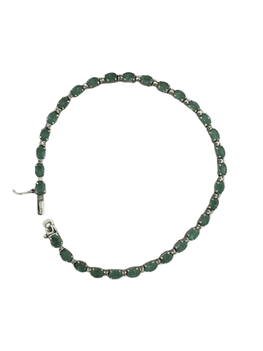 Bracelet Bracelet rivière en or gris 18k, émeraudes et diamants 58 Facettes LOT 7437