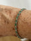 Bracelet Bracelet rivière en or gris 18k, émeraudes et diamants 58 Facettes LOT 7437