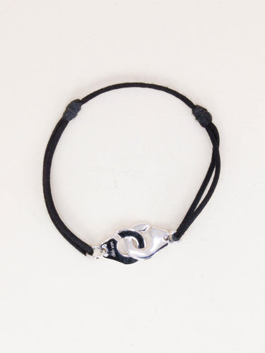 Bracelet DINH VAN Bracelet Menottes R12 or blanc cordon noir 58 Facettes 1215.8