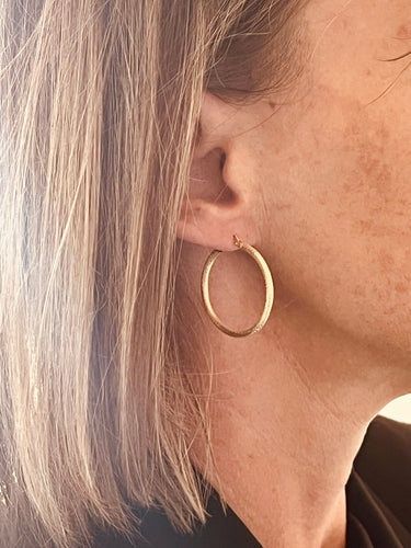 Boucles d'oreilles Boucles d’oreilles créoles texturées en or jaune 18 carats 58 Facettes 45