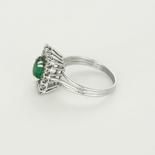 Bague 60 Bague en or blanc, platine, émeraude et diamants 58 Facettes 58FC45