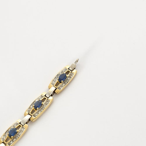 Bracelet Bracelet en or deux tons et saphirs 58 Facettes B250620