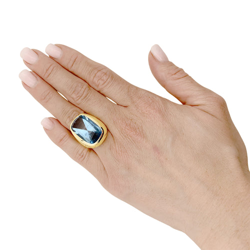 Bague 50 Bague chevalière en or jaune et topaze bleue 58 Facettes 35436