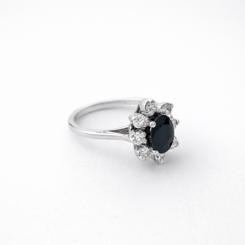 Bague 52 Bague marguerite en or blanc 18 carats, saphir et diamants 58 Facettes 35995