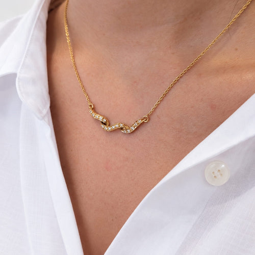 Collier Collier ondulé en or jaune et diamants 58 Facettes 35306